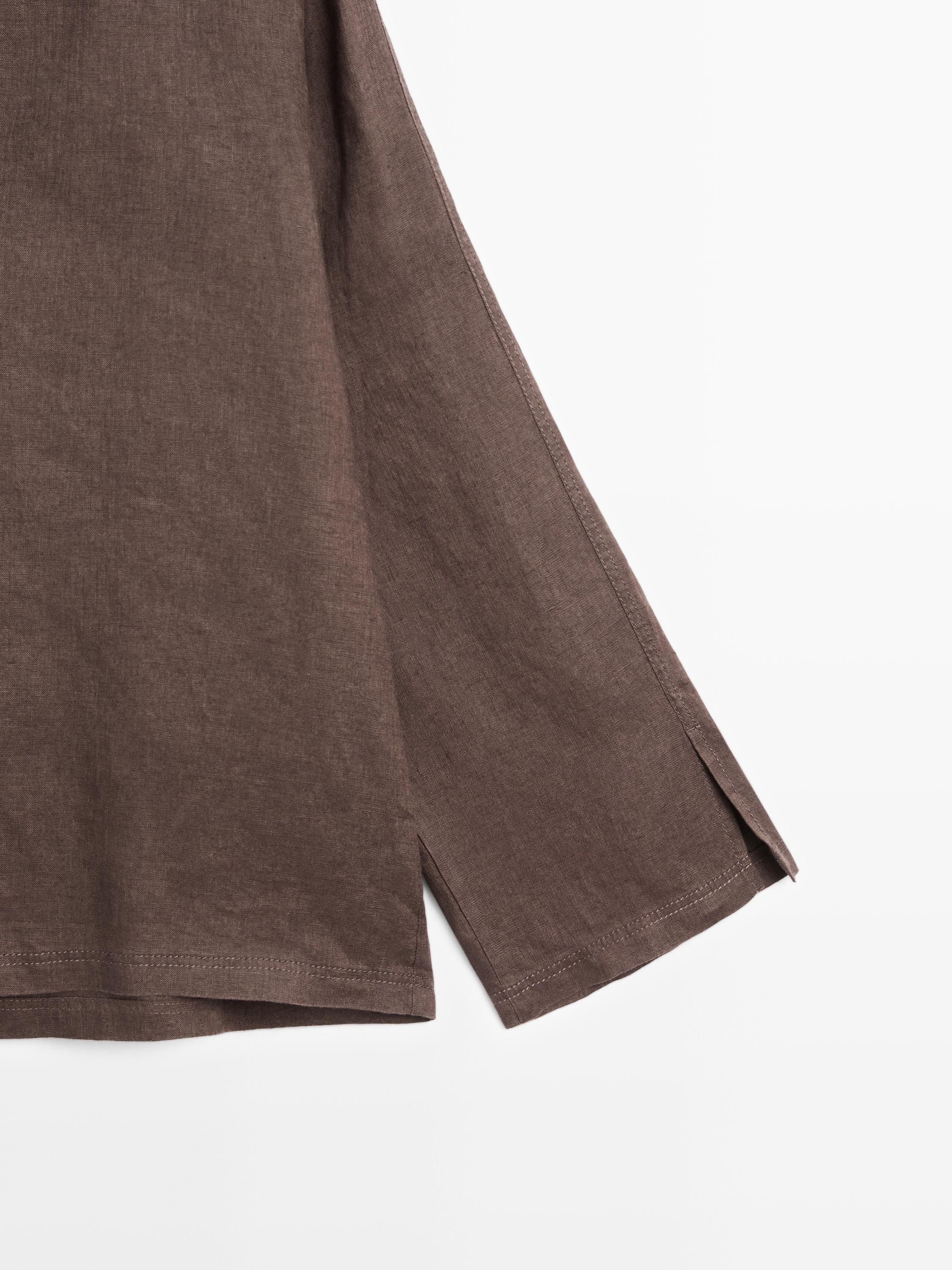 100% linen blouse with topstitching detail